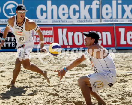 Beachvolleyball Grand Slam.  Michael Leeb, Daniel Hupfer (AUT). Klagenfurt, 18.7.2012
Foto: Kuess

---
pressefotos, pressefotografie, kuess, qs, qspictures, sport, bild, bilder, bilddatenbank