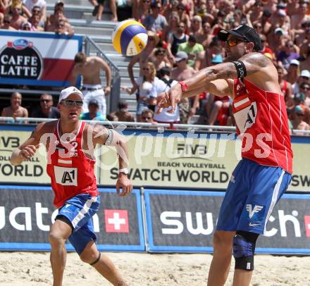 Beachvolleyball Grand Slam.  Clemens Doppler, Alexander Horst (AUT). Klagenfurt, 19.7.2012
Foto: Kuess

---
pressefotos, pressefotografie, kuess, qs, qspictures, sport, bild, bilder, bilddatenbank