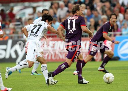 Fussball. Bundesliga. RZ Pellets WAC gegen FK Austria Wien. Michele Polverino,  (WAC), Tomas Jun (Wien). Wolfsberg, 25.7.2012.
Foto: Kuess


---
pressefotos, pressefotografie, kuess, qs, qspictures, sport, bild, bilder, bilddatenbank