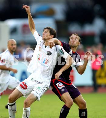 Fussball. Bundesliga. RZ Pellets WAC gegen FK Austria Wien. Christian Falk, (WAC), Manuel Ortlechner  (Wien). Wolfsberg, 25.7.2012.
Foto: Kuess


---
pressefotos, pressefotografie, kuess, qs, qspictures, sport, bild, bilder, bilddatenbank