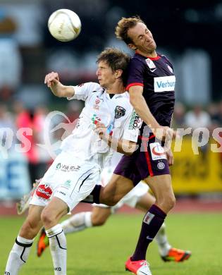 Fussball. Bundesliga. RZ Pellets WAC gegen FK Austria Wien.  Christian Falk, (WAC), Manuel Ortlechner  (Wien).. Wolfsberg, 25.7.2012.
Foto: Kuess


---
pressefotos, pressefotografie, kuess, qs, qspictures, sport, bild, bilder, bilddatenbank