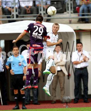 Fussball. Bundesliga. RZ Pellets WAC gegen FK Austria Wien. Manuel Kerhe, (WAC), Markus Suttner (Wien). Wolfsberg, 25.7.2012.
Foto: Kuess


---
pressefotos, pressefotografie, kuess, qs, qspictures, sport, bild, bilder, bilddatenbank