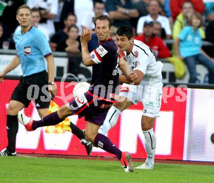 Fussball. Bundesliga. RZ Pellets WAC gegen FK Austria Wien. Mihret Topcagic,  (WAC), Manuel Ortlechner (Wien). Wolfsberg, 25.7.2012.
Foto: Kuess


---
pressefotos, pressefotografie, kuess, qs, qspictures, sport, bild, bilder, bilddatenbank