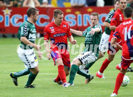 Fussball Regionalliga. Feldkirchen gegen SAK.  Mathias Regal, Michael Wernig,  (Feldkirchen), Darijo Biscan (SAK). Feldkirchen, 3.8.2012.
Foto: Kuess
---
pressefotos, pressefotografie, kuess, qs, qspictures, sport, bild, bilder, bilddatenbank