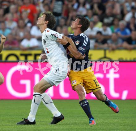 Fussball. Bundesliga. RZ Pellets WAC gegen FC Red Bull Salzburg. Christian Falk, (WAC),  Franz Schiemer (Salzburg). Wolfsberg, 4.8.2012.
Foto: Kuess

---
pressefotos, pressefotografie, kuess, qs, qspictures, sport, bild, bilder, bilddatenbank