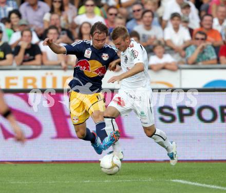 Fussball. Bundesliga. RZ Pellets WAC gegen FC Red Bull Salzburg. Manuel Kerhe, (WAC),  Andreas Ulmer (Salzburg). Wolfsberg, 4.8.2012.
Foto: Kuess

---
pressefotos, pressefotografie, kuess, qs, qspictures, sport, bild, bilder, bilddatenbank