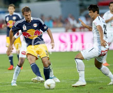 Fussball. Bundesliga. RZ Pellets WAC gegen FC Red Bull Salzburg. Mihret Topcagic, (WAC),  Stefan Ilsanker (Salzburg). Wolfsberg, 4.8.2012.
Foto: Kuess

---
pressefotos, pressefotografie, kuess, qs, qspictures, sport, bild, bilder, bilddatenbank