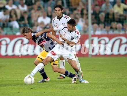 Fussball. Bundesliga. RZ Pellets WAC gegen FC Red Bull Salzburg. Ruben Rivera, (WAC), Christoph Leitgeb  (Salzburg). Wolfsberg, 4.8.2012.
Foto: Kuess

---
pressefotos, pressefotografie, kuess, qs, qspictures, sport, bild, bilder, bilddatenbank