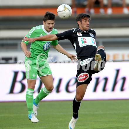 Fussball Testspiel. RZ Pellets WAC gegen VfL Wolfsburg. Gernot Suppan, (WAC), Vaclav Pilar  (Wolfsburg). Wolfsberg, 7.8.2012.
Foto: Kuess
---
pressefotos, pressefotografie, kuess, qs, qspictures, sport, bild, bilder, bilddatenbank