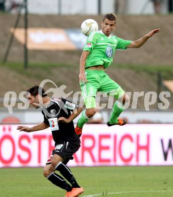 Fussball Testspiel. RZ Pellets WAC gegen VfL Wolfsburg. Sandro Zakany,  (WAC), Hasani Ferhan (Wolfsburg). Wolfsberg, 7.8.2012.
Foto: Kuess
---
pressefotos, pressefotografie, kuess, qs, qspictures, sport, bild, bilder, bilddatenbank