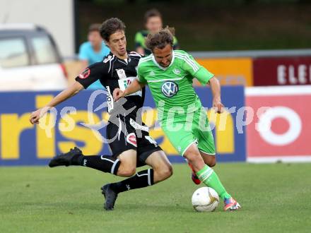 Fussball Testspiel. RZ Pellets WAC gegen VfL Wolfsburg. Christian Falk, (WAC), Petr Jiracek  (Wolfsburg). Wolfsberg, 7.8.2012.
Foto: Kuess
---
pressefotos, pressefotografie, kuess, qs, qspictures, sport, bild, bilder, bilddatenbank