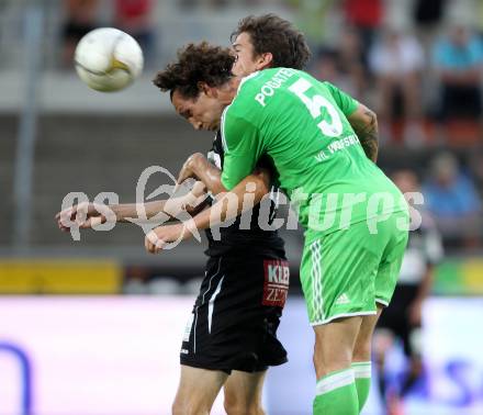 Fussball Testspiel. RZ Pellets WAC gegen VfL Wolfsburg. Christian Falk, (WAC), Emanuel Pogatetz  (Wolfsburg). Wolfsberg, 7.8.2012.
Foto: Kuess
---
pressefotos, pressefotografie, kuess, qs, qspictures, sport, bild, bilder, bilddatenbank