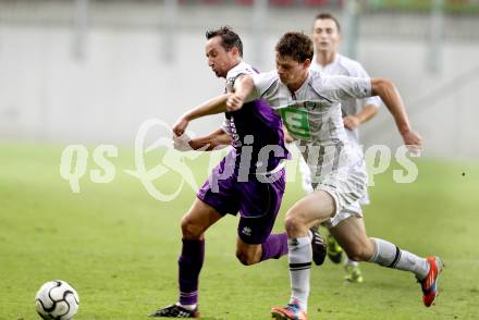 Fussball Regionalliga. SK Austria Klagenfurt gegen Sturm Graz Amateure. Matthias Dollinger,  (Klagenfurt), Felix Schmied (Graz). Klagenfurt, 10.8.2012.
Foto: Kuess


---
pressefotos, pressefotografie, kuess, qs, qspictures, sport, bild, bilder, bilddatenbank