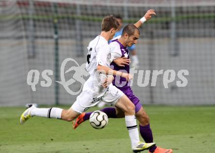 Fussball Regionalliga. SK Austria Klagenfurt gegen Sturm Graz Amateure. Rexhe Bytyci,  (Klagenfurt), Joerg Jauk (Graz). Klagenfurt, 10.8.2012.
Foto: Kuess


---
pressefotos, pressefotografie, kuess, qs, qspictures, sport, bild, bilder, bilddatenbank