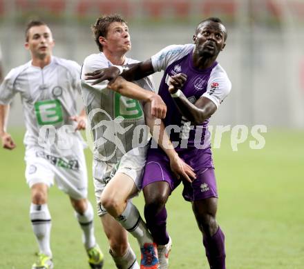 Fussball Regionalliga. SK Austria Klagenfurt gegen Sturm Graz Amateure. Thierry Fidjeu Tazemeta,  (Klagenfurt), Felix Schmied (Graz). Klagenfurt, 10.8.2012.
Foto: Kuess


---
pressefotos, pressefotografie, kuess, qs, qspictures, sport, bild, bilder, bilddatenbank