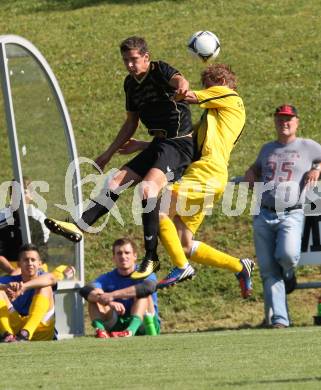 Fussball Kaerntner Liga. Koettmannsdorf gegen Drautal. Pibal Christoph (Koettmannsdorf), Steiner Domenik (Drautal). Koettmannsdorf, am 12.8.2012.
Foto: Kuess

---
pressefotos, pressefotografie, kuess, qs, qspictures, sport, bild, bilder, bilddatenbank