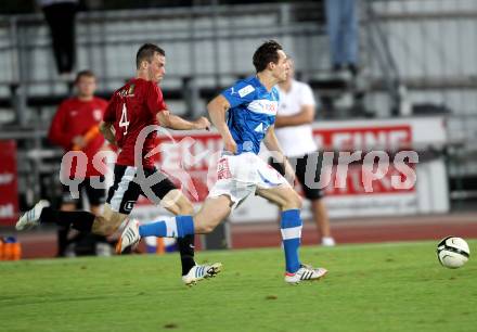 Fussball. Regionalliga. VSV gegen St. Florian. Kircher Lukas (VSV), Hinterreiter Roland (St. Florian). Villach, 17.8.2012.
Foto: Kuess
---
pressefotos, pressefotografie, kuess, qs, qspictures, sport, bild, bilder, bilddatenbank