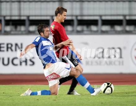 Fussball. Regionalliga. VSV gegen St. Florian. Steiner Mario (VSV), Winkler Dominic (St. Florian). Villach, 17.8.2012.
Foto: Kuess
---
pressefotos, pressefotografie, kuess, qs, qspictures, sport, bild, bilder, bilddatenbank