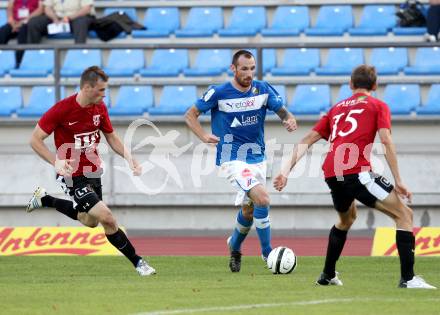 Fussball. Regionalliga. VSV gegen St. Florian. Pavlicic Rok (VSV), Hinterreiter Roland (St. Florian). Villach, 17.8.2012.
Foto: Kuess
---
pressefotos, pressefotografie, kuess, qs, qspictures, sport, bild, bilder, bilddatenbank