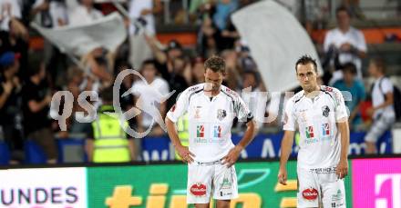 Fussball. Bundesliga. RZ Pellets WAC gegen SV Mattersburg. Gernot Messner, Michael Liendl (WAC). Wolfsberg, 18.8.2012.
Foto: Kuess

---
pressefotos, pressefotografie, kuess, qs, qspictures, sport, bild, bilder, bilddatenbank