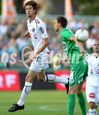 Fussball. Bundesliga. RZ Pellets WAC gegen SV Mattersburg. Christian Falk,  (WAC), Florin Lovin (Mattersburg). Wolfsberg, 18.8.2012.
Foto: Kuess

---
pressefotos, pressefotografie, kuess, qs, qspictures, sport, bild, bilder, bilddatenbank