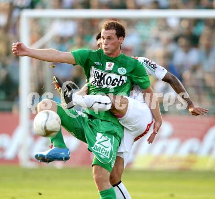 Fussball. Bundesliga. RZ Pellets WAC gegen SV Mattersburg. Solano,  (WAC), Patrick Buerger (Mattersburg). Wolfsberg, 18.8.2012.
Foto: Kuess

---
pressefotos, pressefotografie, kuess, qs, qspictures, sport, bild, bilder, bilddatenbank