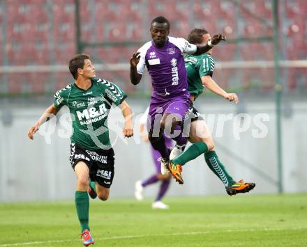 Fussball Regionalliga. SK Austria Klagenfurt gegen Feldkirchen. Thierry Fidjeu Tazemeta,  (Austria), Marco Huber (Feldkirchen). Klagenfurt, am 21.8.2012.
Foto: Kuess
---
pressefotos, pressefotografie, kuess, qs, qspictures, sport, bild, bilder, bilddatenbank