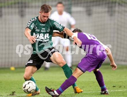 Fussball Regionalliga. SK Austria Klagenfurt gegen Feldkirchen. Matthias Dollinger,  (Austria),  Jakob Gruber (Feldkirchen). Klagenfurt, am 21.8.2012.
Foto: Kuess
---
pressefotos, pressefotografie, kuess, qs, qspictures, sport, bild, bilder, bilddatenbank