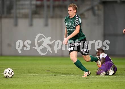 Fussball Regionalliga. SK Austria Klagenfurt gegen Feldkirchen. Thierry Fidjeu Tazemeta, (Austria), Michael Wernig  (Feldkirchen). Klagenfurt, am 21.8.2012.
Foto: Kuess
---
pressefotos, pressefotografie, kuess, qs, qspictures, sport, bild, bilder, bilddatenbank