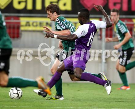 Fussball Regionalliga. SK Austria Klagenfurt gegen Feldkirchen. Thierry Fidjeu Tazemeta, (Austria),  Phlip Wisotzky  (Feldkirchen). Klagenfurt, am 21.8.2012.
Foto: Kuess
---
pressefotos, pressefotografie, kuess, qs, qspictures, sport, bild, bilder, bilddatenbank