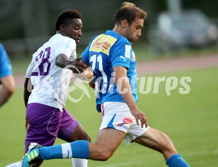 Fussball Regionalliga. VSV gegen SK Austria Klagenfurt. Marco reich,  (VSV). Christian Makanda Mpaka (Austria Klagenfurt). Villach, 24.8.2012.
Foto: Kuess
---
pressefotos, pressefotografie, kuess, qs, qspictures, sport, bild, bilder, bilddatenbank