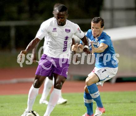 Fussball Regionalliga. VSV gegen SK Austria Klagenfurt. Emre Okatan,  (VSV). Thierry Fidjeu Tazemeta (Austria Klagenfurt). Villach, 24.8.2012.
Foto: Kuess
---
pressefotos, pressefotografie, kuess, qs, qspictures, sport, bild, bilder, bilddatenbank