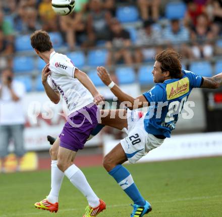 Fussball Regionalliga. VSV gegen SK Austria Klagenfurt. Michael Kirisits,  (VSV). Stefan Erkinger (Austria Klagenfurt). Villach, 24.8.2012.
Foto: Kuess
---
pressefotos, pressefotografie, kuess, qs, qspictures, sport, bild, bilder, bilddatenbank