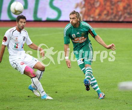 Fussball. Bundesliga. RZ Pellets WAC gegen Rapid Wien. Ruben Rivera,  (WAC), Harald Pichler (Rapid). Wolfsberg, 26.8.2012.
Foto: Kuess

---
pressefotos, pressefotografie, kuess, qs, qspictures, sport, bild, bilder, bilddatenbank