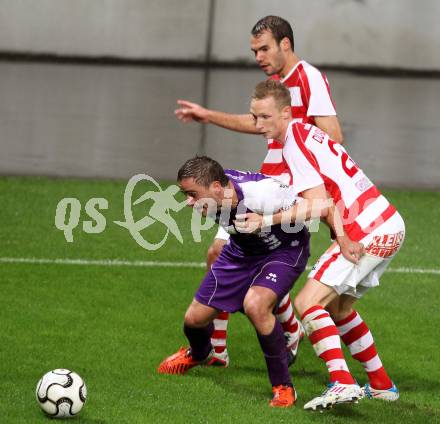 Fussball Regionalliga. SK Austria Klagenfurt gegen GAK. Grega Triplat, (Klagenfurt), Patrick Durlacher  (GAK). Klagenfurt, 1.9.2012.
Foto: kuess
---
pressefotos, pressefotografie, kuess, qs, qspictures, sport, bild, bilder, bilddatenbank