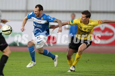 Fussball. Regionalliga. VSV gegen Allerheiligen. Rok Pavlicic,  (VSV), Marko Kocever (Allerheiligen). Villach, 7.9.2012.
Foto: Kuess
---
pressefotos, pressefotografie, kuess, qs, qspictures, sport, bild, bilder, bilddatenbank