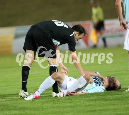 Fussball. Kaerntner Liga. St. Veit/Glan gegen WAC Amateure. Adunka Roman (St. Veit), Kroepfl Mario (WAC). St. Veit, 7.9.2012.
Foto: Kuess
---
pressefotos, pressefotografie, kuess, qs, qspictures, sport, bild, bilder, bilddatenbank