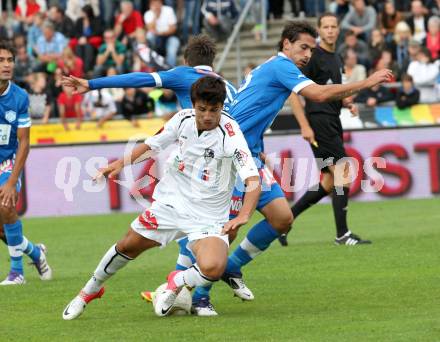 Fussball. Bundesliga. RZ Pellets WAC gegen SC Wiener Neustadt. Mihret Topcagic,  (WAC), Manuel Wallner (Wiener Neustadt). Wolfsberg, 15.9.2012.
Foto: Kuess

---
pressefotos, pressefotografie, kuess, qs, qspictures, sport, bild, bilder, bilddatenbank