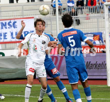 Fussball. Bundesliga. RZ Pellets WAC gegen SC Wiener Neustadt. Christian Falk (WAC), Hlinka Peter (K) (Wiener Neustadt). Wolfsberg, 15.9.2012.
Foto: Kuess

---
pressefotos, pressefotografie, kuess, qs, qspictures, sport, bild, bilder, bilddatenbank