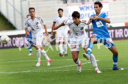 Fussball. Bundesliga. RZ Pellets WAC gegen SC Wiener Neustadt. Mihret Topcagic,  (WAC), Peter Hlinka (Wiener Neustadt). Wolfsberg, 15.9.2012.
Foto: Kuess

---
pressefotos, pressefotografie, kuess, qs, qspictures, sport, bild, bilder, bilddatenbank