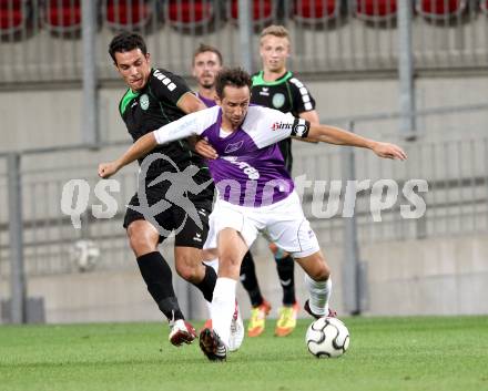 Fussball Regionalliga. SK Austria Klagenfurt gegen Pasching. Matthias Dollinger,  (Klagenfurt), Diaz Casanova Montenegro Ignacio (Pasching). Klagenfurt, 15.9.2012. 
Foto: Kuess

---
pressefotos, pressefotografie, kuess, qs, qspictures, sport, bild, bilder, bilddatenbank