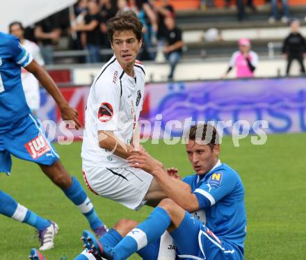 Fussball. Bundesliga. RZ Pellets WAC gegen SC Wiener Neustadt. Christian Falk (WAC), Ramsebner Christian (Wiener Neustadt). Wolfsberg, 15.9.2012.
Foto: Kuess

---
pressefotos, pressefotografie, kuess, qs, qspictures, sport, bild, bilder, bilddatenbank