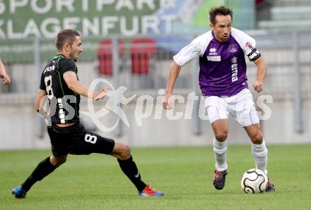 Fussball Regionalliga. SK Austria Klagenfurt gegen Pasching. Matthias Dollinger,  (Klagenfurt), Ali Hamdemir (Pasching). Klagenfurt, 15.9.2012. 
Foto: Kuess

---
pressefotos, pressefotografie, kuess, qs, qspictures, sport, bild, bilder, bilddatenbank
