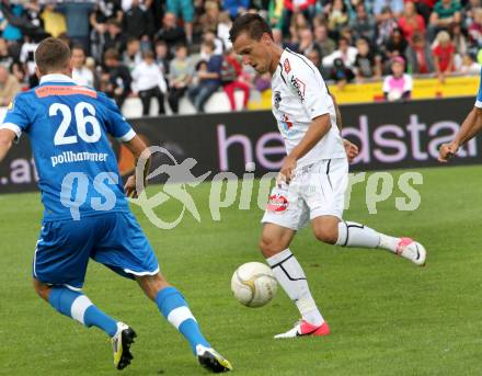 Fussball. Bundesliga. RZ Pellets WAC gegen SC Wiener Neustadt. Michael Liendl,  (WAC), Mario Pollhammer (Wiener Neustadt). Wolfsberg, 15.9.2012.
Foto: Kuess

---
pressefotos, pressefotografie, kuess, qs, qspictures, sport, bild, bilder, bilddatenbank