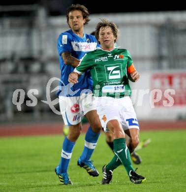 Fussball Regionalliga. VSV gegen SV Wallern. Michael Kirisits,  (VSV), Herwig Drechsel (Wallern). Villach, 20.8.2012.
Foto: Kuess
---
pressefotos, pressefotografie, kuess, qs, qspictures, sport, bild, bilder, bilddatenbank