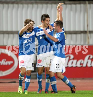 Fussball Regionalliga. VSV gegen SV Wallern. Torjubel Daniel Pirker, Michel Sandic, Patrick Striednig (VSV). Villach, 20.8.2012.
Foto: Kuess
---
pressefotos, pressefotografie, kuess, qs, qspictures, sport, bild, bilder, bilddatenbank