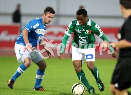 Fussball Regionalliga. VSV gegen SV Wallern. Patrick triednig,  (VSV), Harrison Kennedy (Wallern). Villach, 20.8.2012.
Foto: Kuess
---
pressefotos, pressefotografie, kuess, qs, qspictures, sport, bild, bilder, bilddatenbank