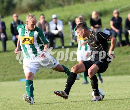 Fussball. Kaerntner Liga. Koettmannsdorf gegen Voelkermarkt. Globotschnig Daniel (Koettmannsdorf), Karner Alexander (Voelkermarkt). Koettmannsdorf, 22.9.2012.
Foto: Kuess
---
pressefotos, pressefotografie, kuess, qs, qspictures, sport, bild, bilder, bilddatenbank