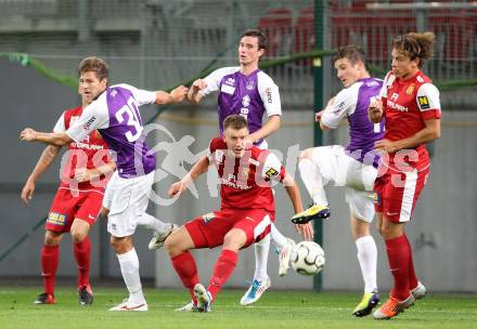 Fussball OEFB Cup. SK Austria Klagenfurt gegen FC Admira Wacker Moedling. Boris Huettenbrenner, Stefan Erkinger, Hannes Eder (Austria), Daniel Drescher (Admira). Klagenfurt, am 25.9.2012.
Foto: Kuess
---
pressefotos, pressefotografie, kuess, qs, qspictures, sport, bild, bilder, bilddatenbank