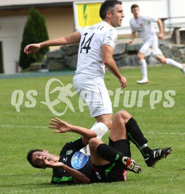 Fussball Kaerntner Liga. ATUS Ferlach gegen Rapid Lienz. Darko Djukic (Ferlach), Patrick Eder (Lienz). Ferlach, am 29.9.2012.
Foto:Kuess
---
pressefotos, pressefotografie, kuess, qs, qspictures, sport, bild, bilder, bilddatenbank